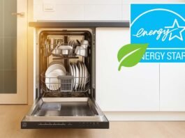 Open energy-efficient dishwasher in a modern American kitchen with glowing Energy Star label and green eco leaf icon, sunlight highlighting its stainless steel design — symbolizing smart and sustainable living in 2025