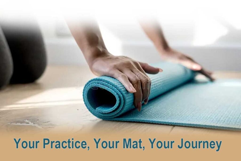 Yogi rolling up a yoga mat at sunset after a peaceful practice - best yoga mats of 2025