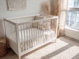 newborn placed safely on their back following AAP safe sleep guidelines