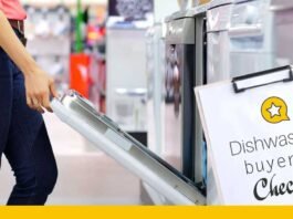 checklist for choosing a dishwasher shown woman with checklist in a retail appliance store