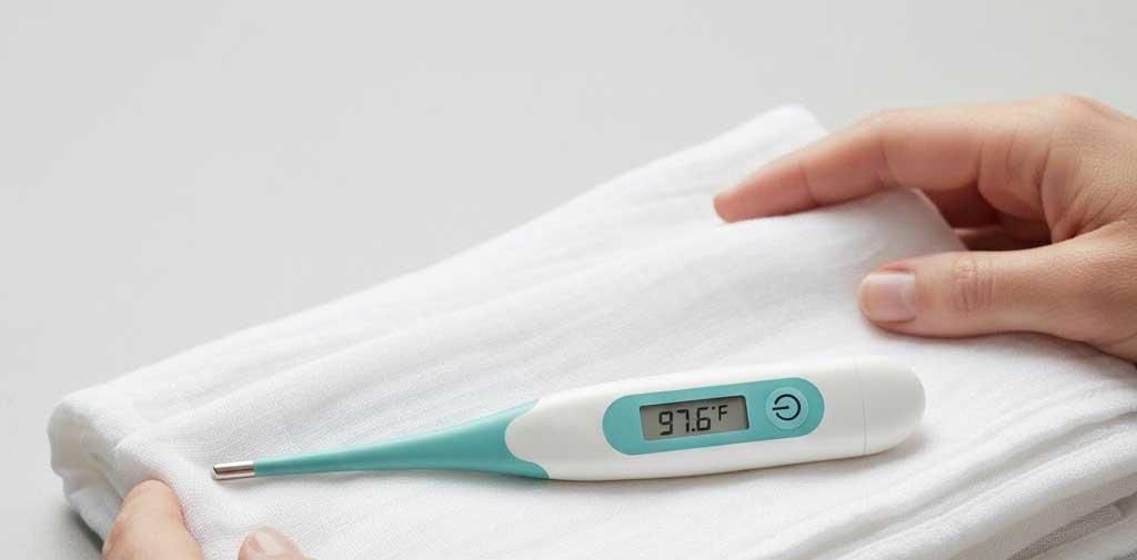 digital baby thermometer prepared for safe newborn temperature check