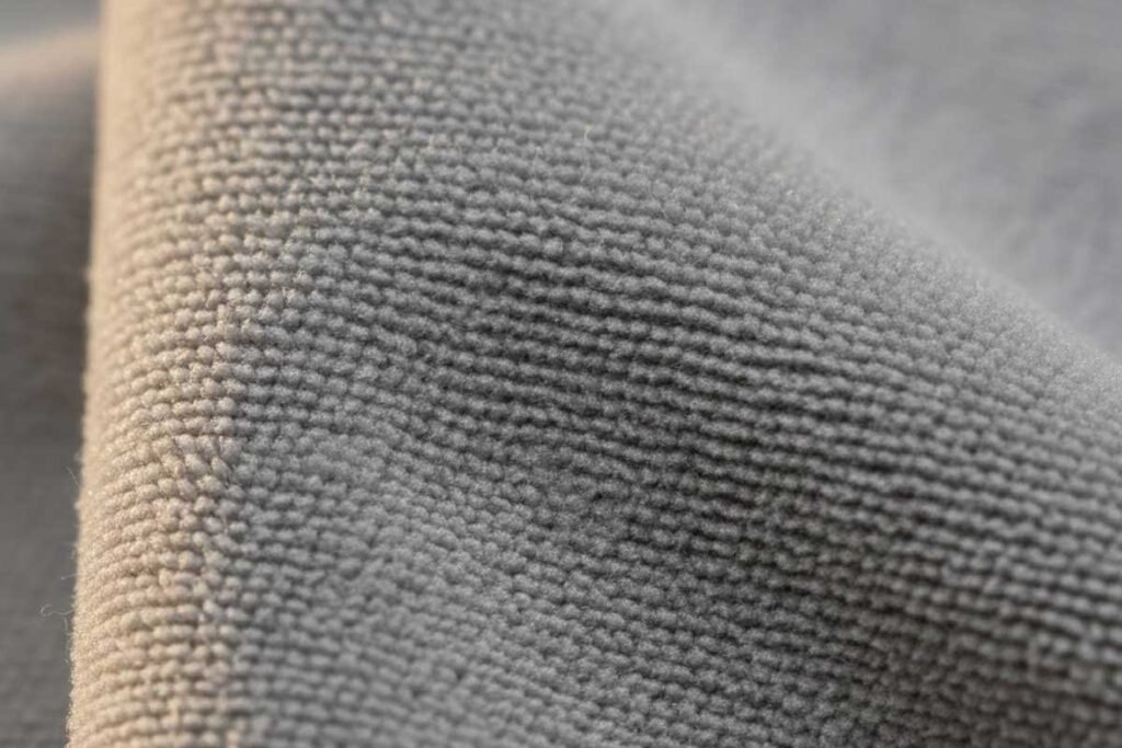 Close-up texture of optical grade microfiber cloth safe for coated binocular lenses