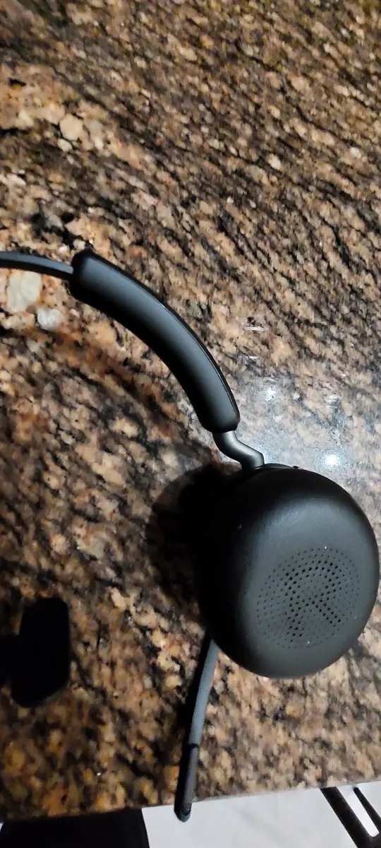 Actual Jabra Evolve2 65 Mono wireless headset photographed during hands-on use